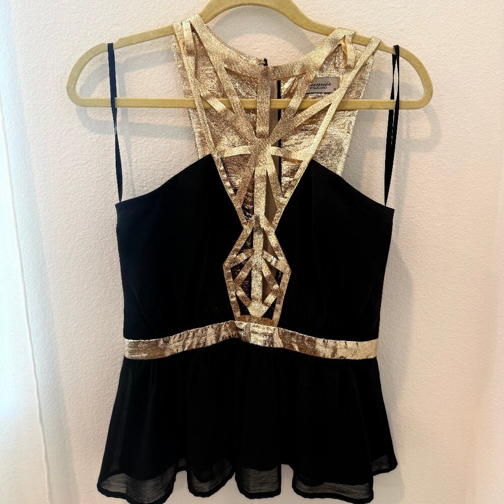 Beautiful, sexy top with gold design. Statement piece!